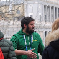 Travel guide Enrique speaking to his group