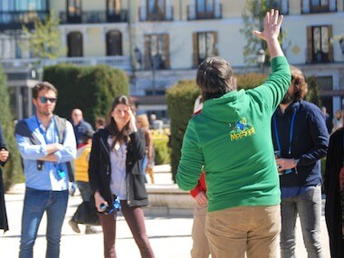 Enrique guiding group of tourists