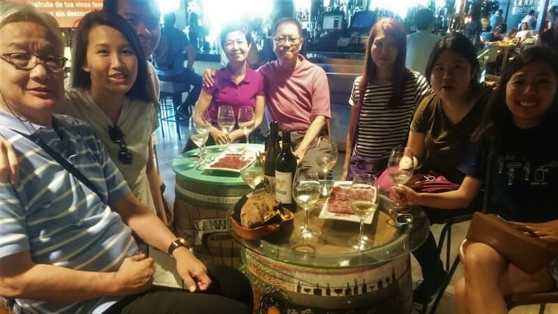 Group of people posing at a restaurant table